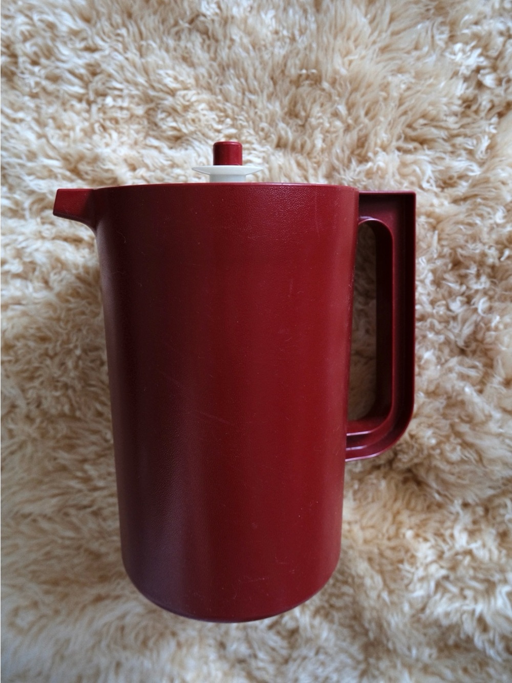 Vintage Tupperware burgundy pitcher